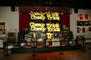 Burpee Museum Cheap Trick exhibit, stage drapery in red velvet.
